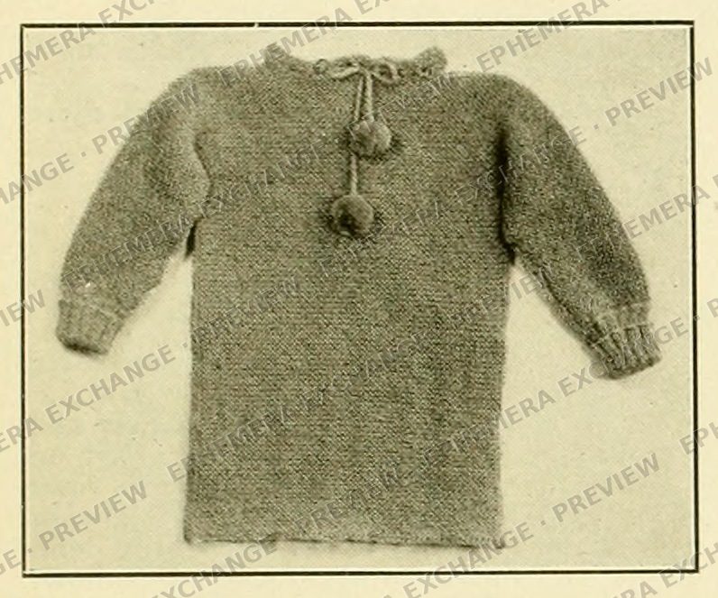 Vintage 1919 knitting photograph: knit sweater with pompoms flat